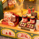 Weihnachtssüßigkeiten und Leckereien, ausgestellt auf dem Tresen des Robotime Christmas Candy Stand