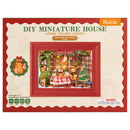 Vorderseite der Verpackung der Robotime Christmas Eve Party, Diorama eines weihnachtlich dekorierten Wohnzimmers mit Lichtern