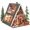 Produktfoto der Robotime A-Frame Cabin, Miniatur-Ferienhaus im winterlichen österreichischen Stil