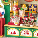 Details der Artikel auf dem Tresen des Robotime Christmas Candy Stand