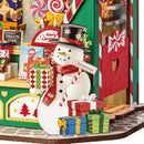 Nahaufnahme des Schneemanns, der vor dem Robotime Christmas Candy Stand steht