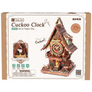 Vorderseite der Verpackung der Robotime Cuckoo Clock Naturfarbenes Holz, Holzbausatz einer Kuckucksuhr in Naturholzfarbe