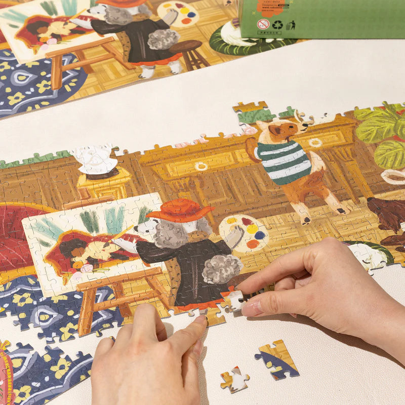 Eine Person macht die Robotime Doggie Art Gallery