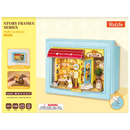 Vorderseite der Verpackung der Robotime Fluffy Cat Bakery, Diorama in einem Rahmen, das eine Bäckerei mit einer Katze zeigt