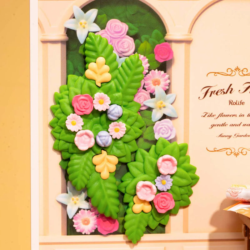 Nahaufnahme der Blumenwand im Robotime Fresh Flower Shop