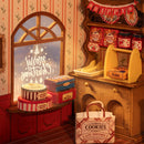 Nahaufnahme von Produkten und einem Fenster im Robotime Gingerbread House