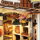 Ausgestelltes Sortiment über der Theke bei Robotime Henry's Chocolate