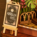 Die stehende Kreidetafel vor der Fassade des Robotime Holiday Café