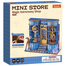 Vorderseite der Verpackung der Robotime Magic Astronomy Shop, Bausatz für ein Miniaturhaus eines Fachgeschäfts für Astronomie