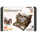 Vorderseite der Verpackung der Robotime Mechanical Typewriter (Classic Version), Holzbausatz einer funktionsfähigen Schreibmaschine in Schwarz und Gold