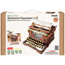 Vorderseite der Verpackung der Robotime Mechanical Typewriter (Magic Version), Holzbausatz einer stilvollen roten, funktionsfähigen Schreibmaschine mit „Alice im Wunderland“-Motiv