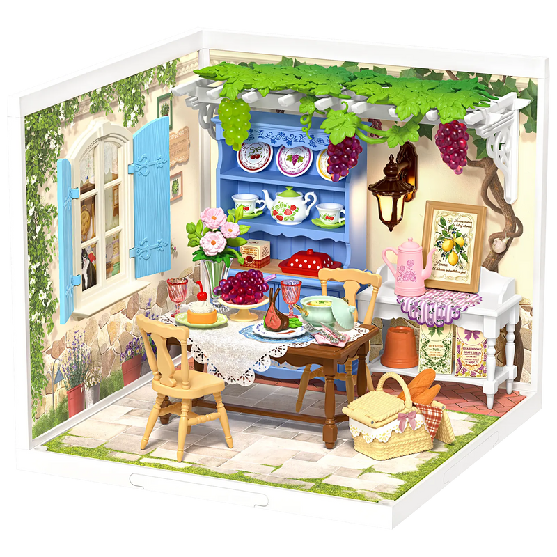 Produktfoto der Robotime Midsummer Dream Yard, Kunststoff-Miniaturterrasse mit gedecktem Tisch, Pergola und Möbeln