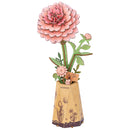 Produktfoto der Robotime Pink Dahlia, Holzbausatz einer rosa Dahlie in einem kartonvasen