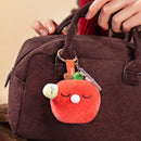 Keep Well Variante aus der Robotime Plush Pendant Nanci Stress-Relief-Serie, an einer Tasche befestigt