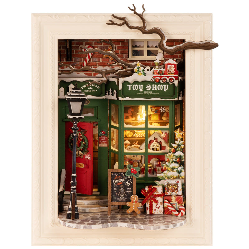 Produktfoto der Robotime Santa’s Toy Shop, Diorama eines weihnachtlich dekorierten Ladens mit Lichtern