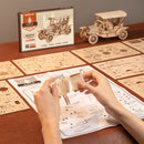 Eine Person ist dabei, das Robotime Vintage Classic Car zu bauen