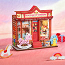 Atmosphärische Präsentation der Robotime Whimsy Toy Shop, Bausatz für ein Miniaturhaus eines Spielzeugladens mit altmodischem Spielzeug